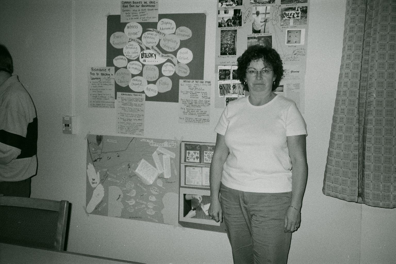 Jan to the right of her poster